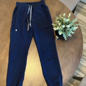 Navy blue joggers. Figs.